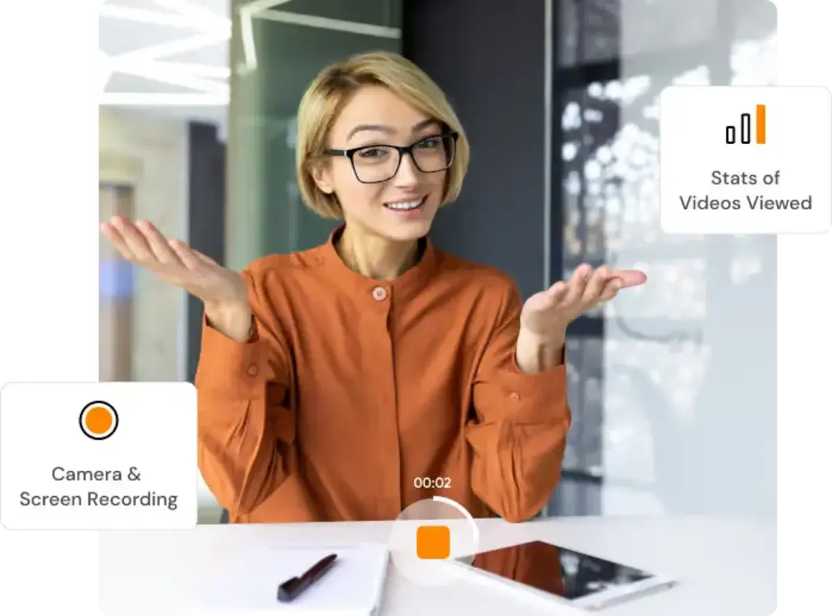 A cheerful woman in an orange blouse presenting something, with an overlay of camera and screen recording interface elements.